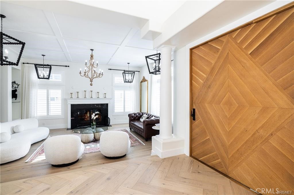 3626 Paseo Primario Calabasas, CA 91302 - Photo 5 of 41 a living room with furniture and a fireplace