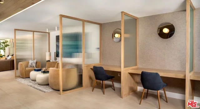 a living room with furniture and a chair