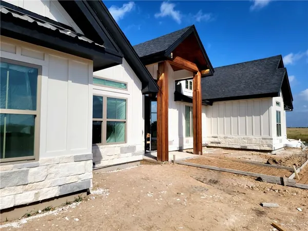 a view of a house with a patio