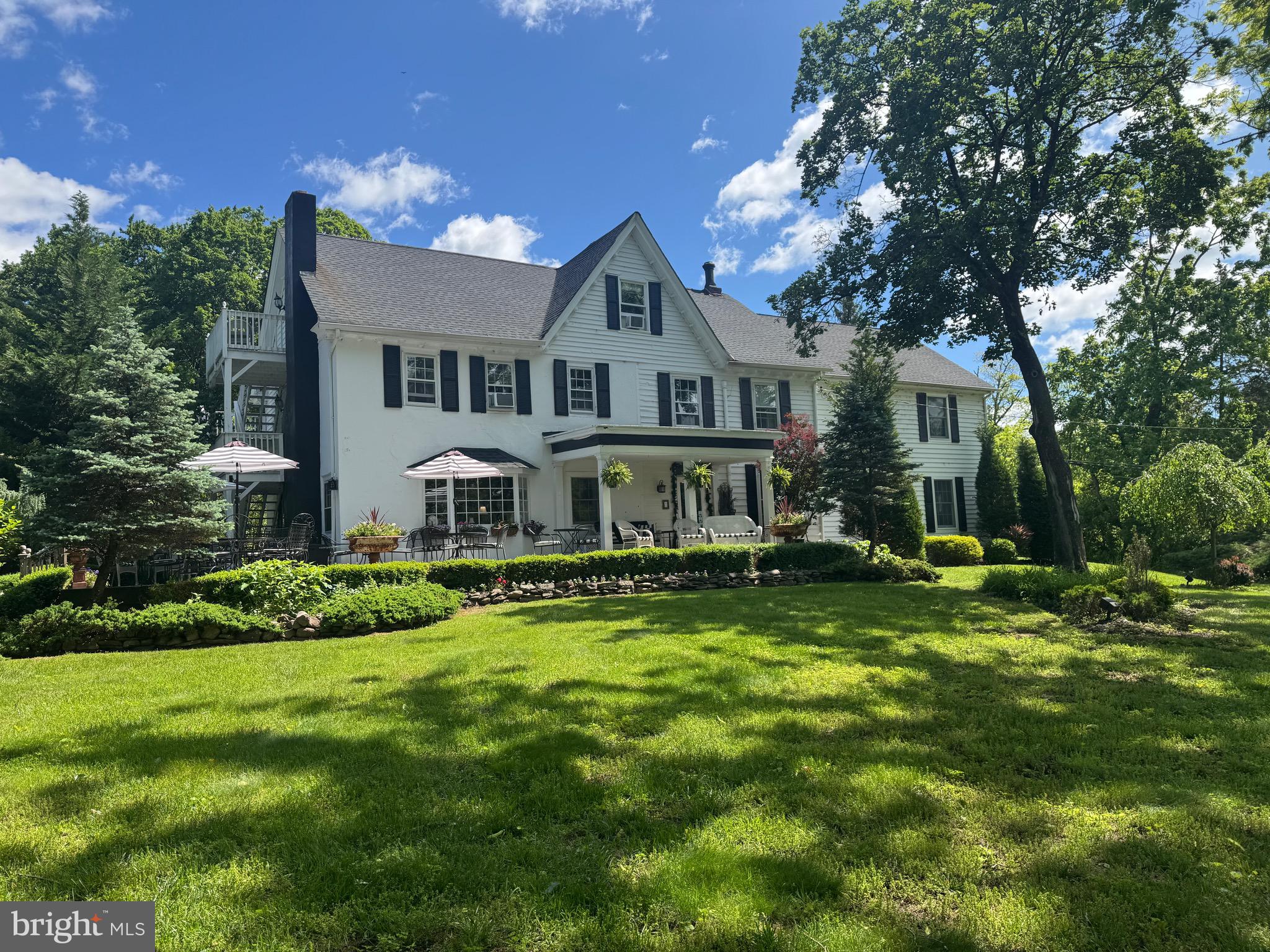 1324 River Road New Hope, PA 18938 - Photo 2 of 70 a front view of house with yard and green space