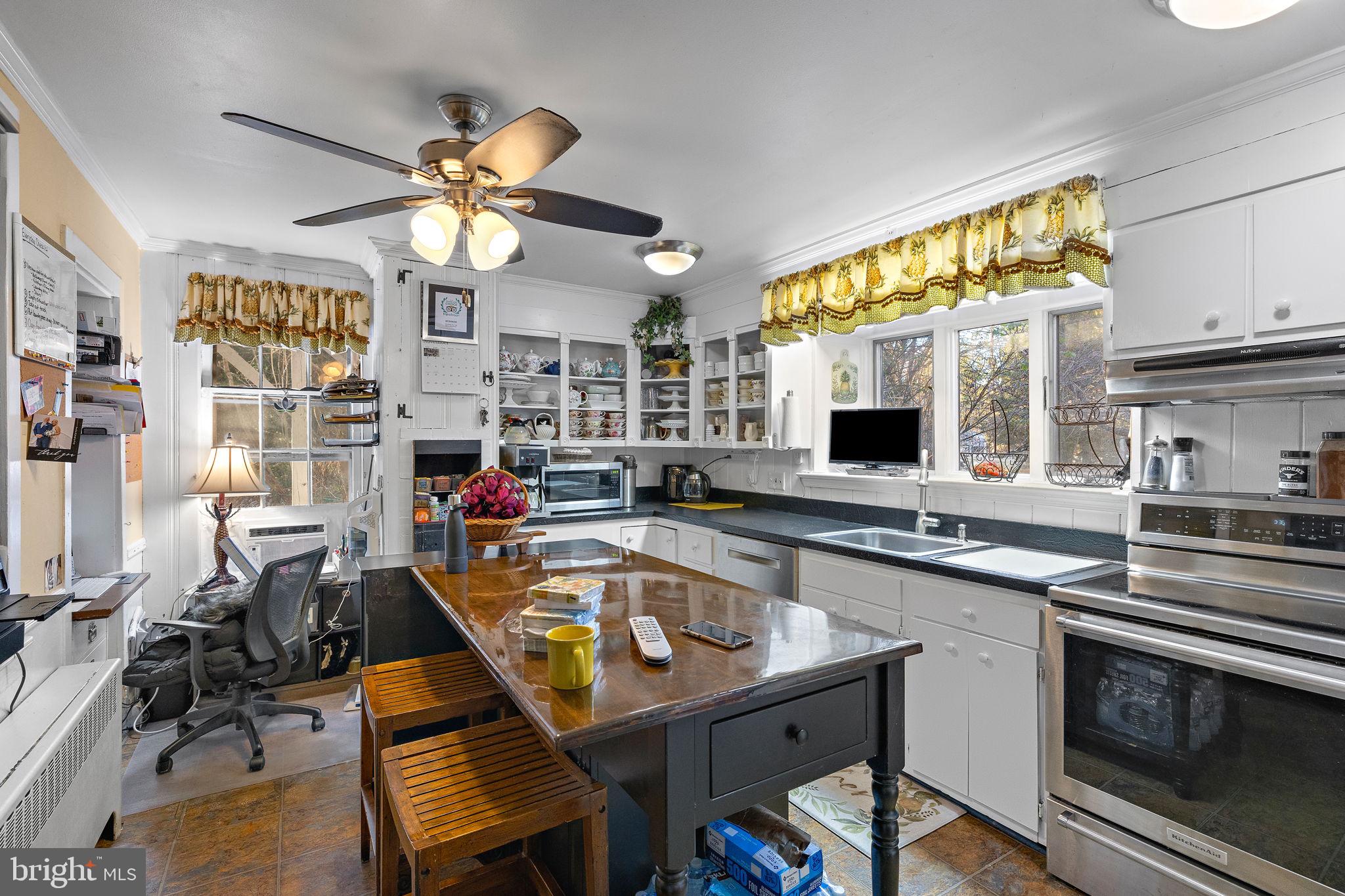 1324 River Road New Hope, PA 18938 - Photo 24 of 70 a kitchen that has a lot of cabinets in it