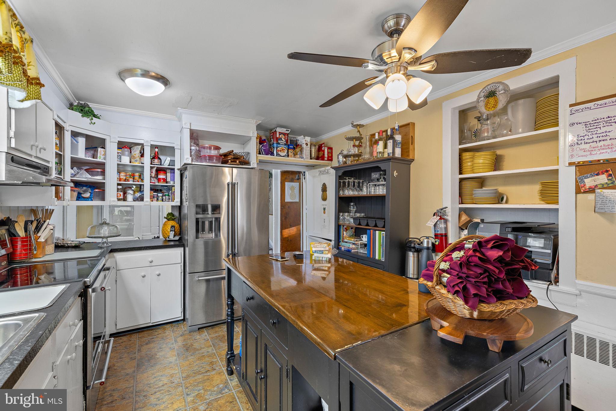 1324 River Road New Hope, PA 18938 - Photo 25 of 70 a kitchen with stainless steel appliances granite countertop a sink dishwasher and a refrigerator with the cabinets