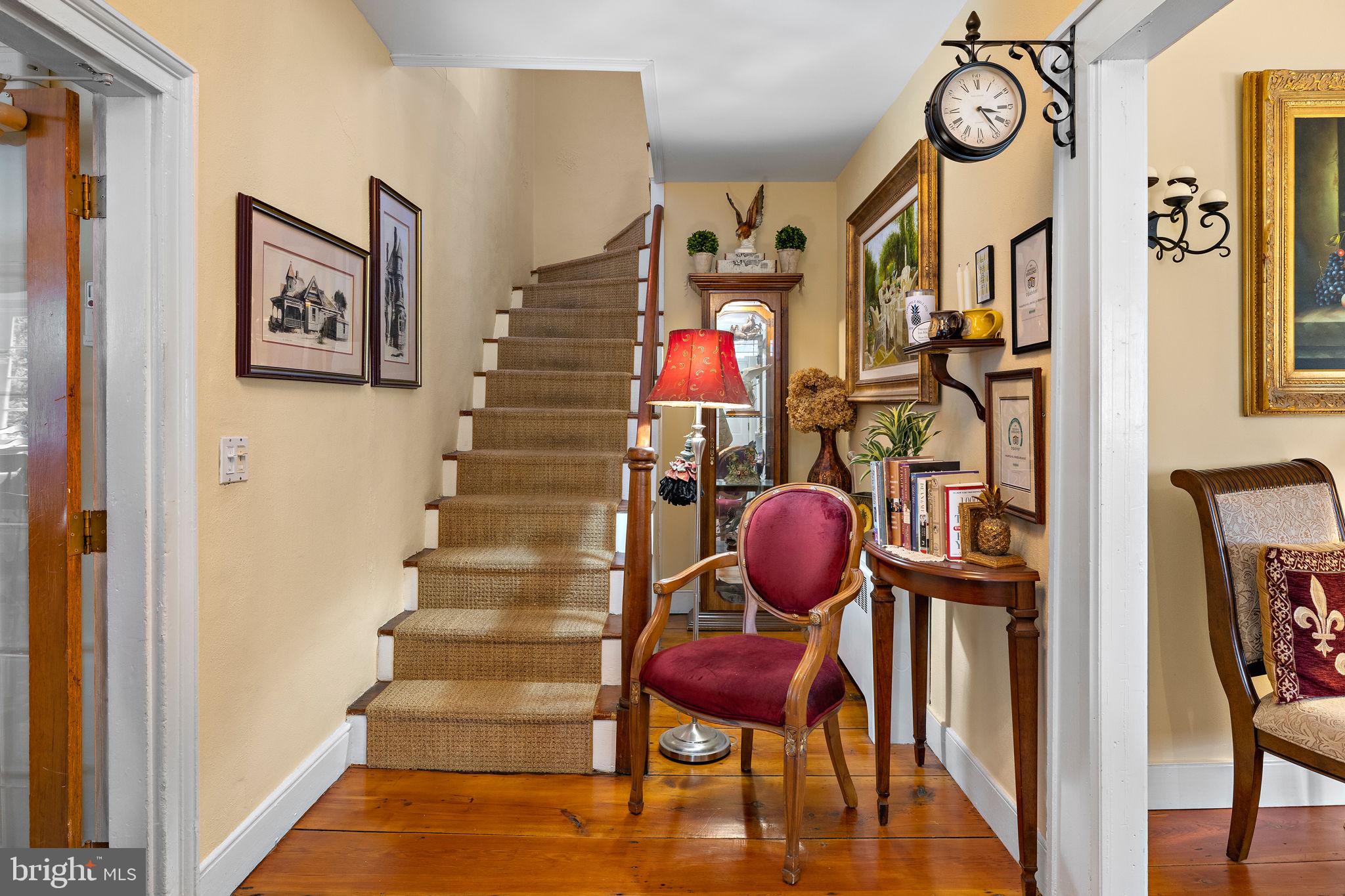 1324 River Road New Hope, PA 18938 - Photo 26 of 70 a view of entryway dining room and hall with wooden floor