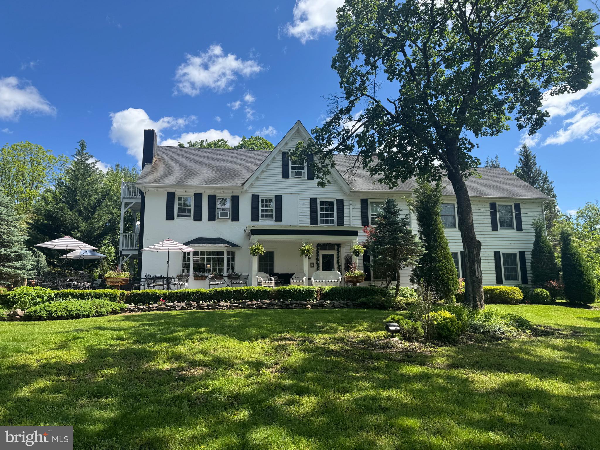 1324 River Road New Hope, PA 18938 - Photo 4 of 70 a front view of a house with a garden