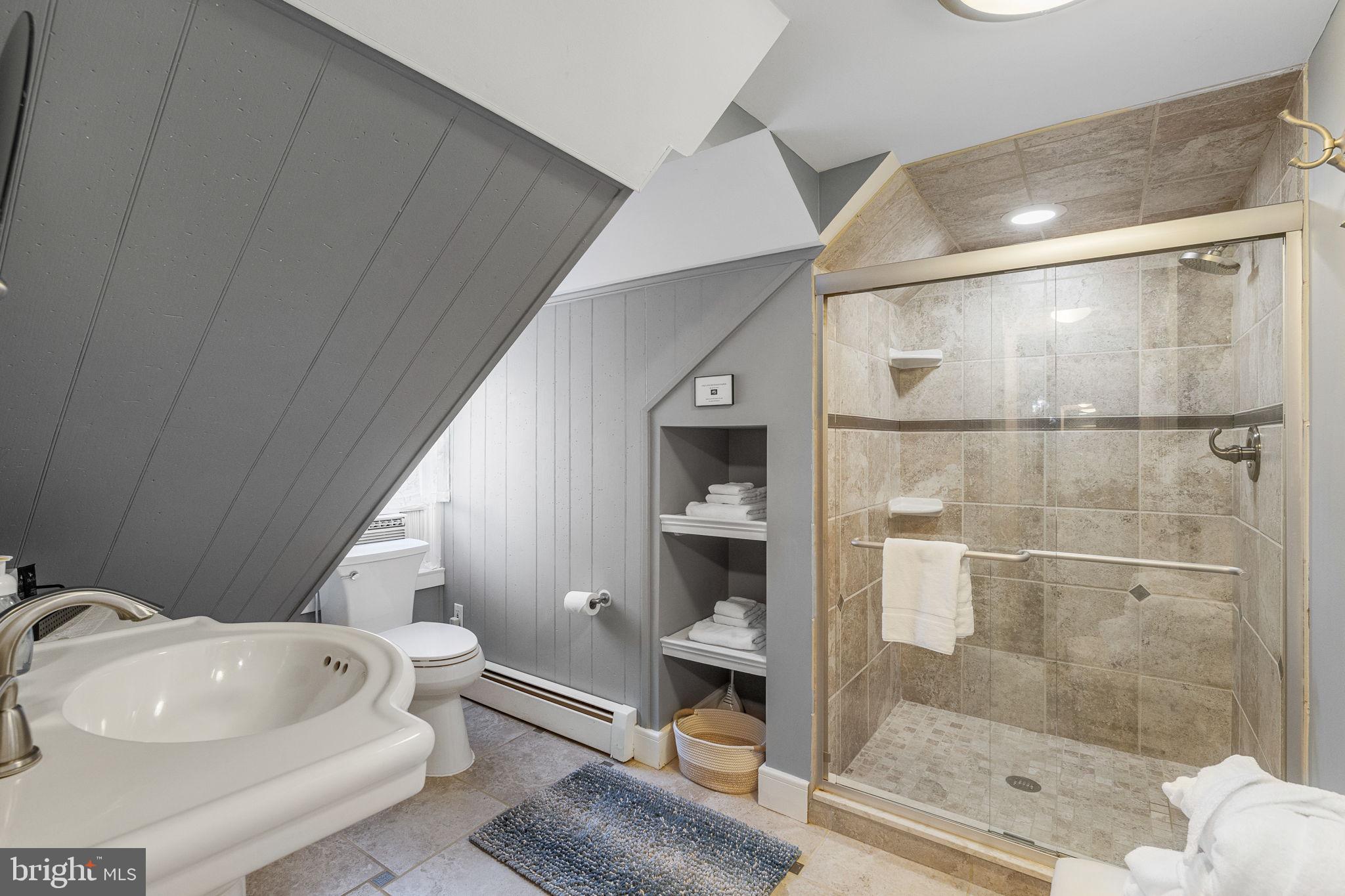 1324 River Road New Hope, PA 18938 - Photo 42 of 70 a bathroom with a bathtub and a shower