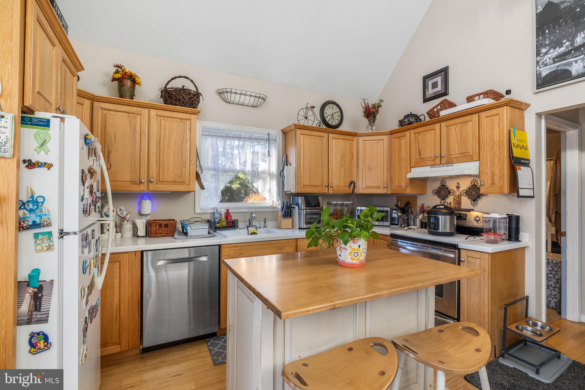 1324 River Road New Hope, PA 18938 - Photo 47 of 70 a kitchen with a sink a stove and cabinets