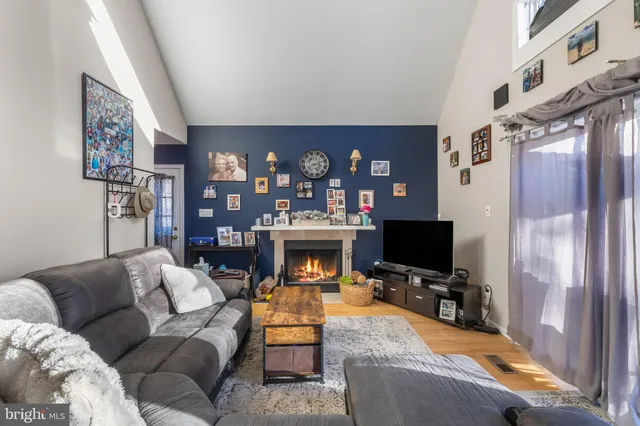 a view of a patio with a table chairs and a porch