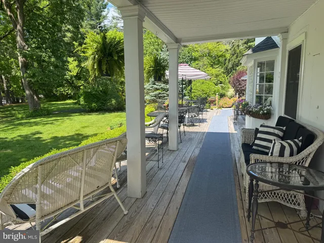 a view of a tree in front of a house