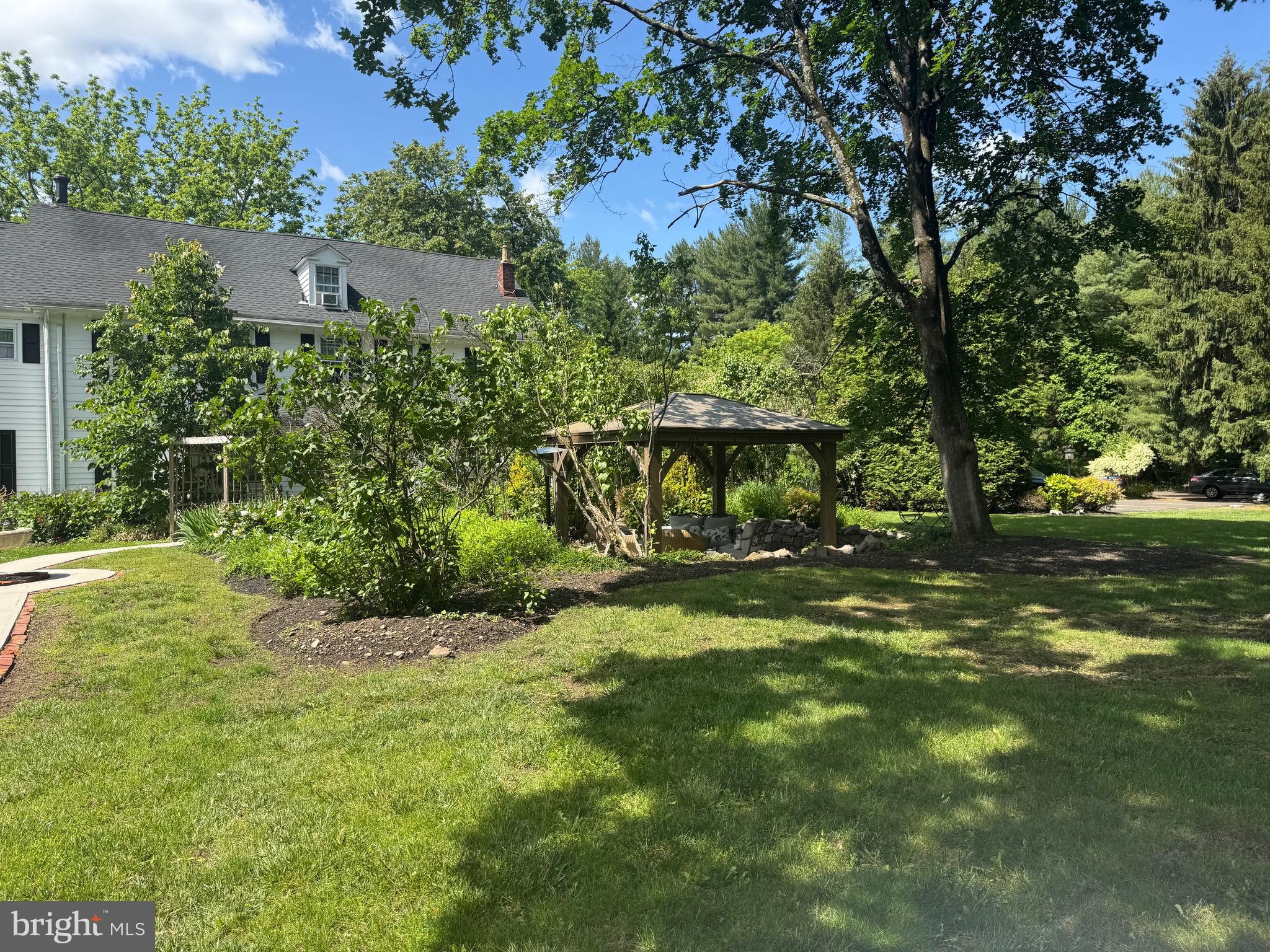 1324 River Road New Hope, PA 18938 - Photo 52 of 70 a view of a big yard with plants and large trees