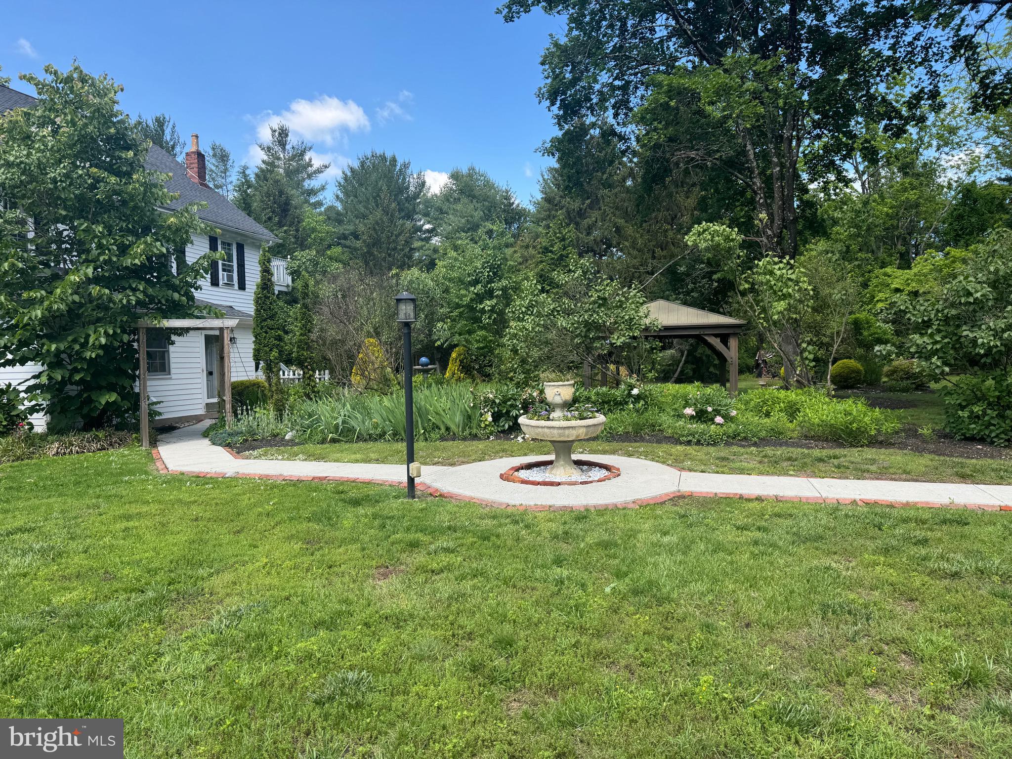 1324 River Road New Hope, PA 18938 - Photo 62 of 70 a view of a house with backyard and sitting area