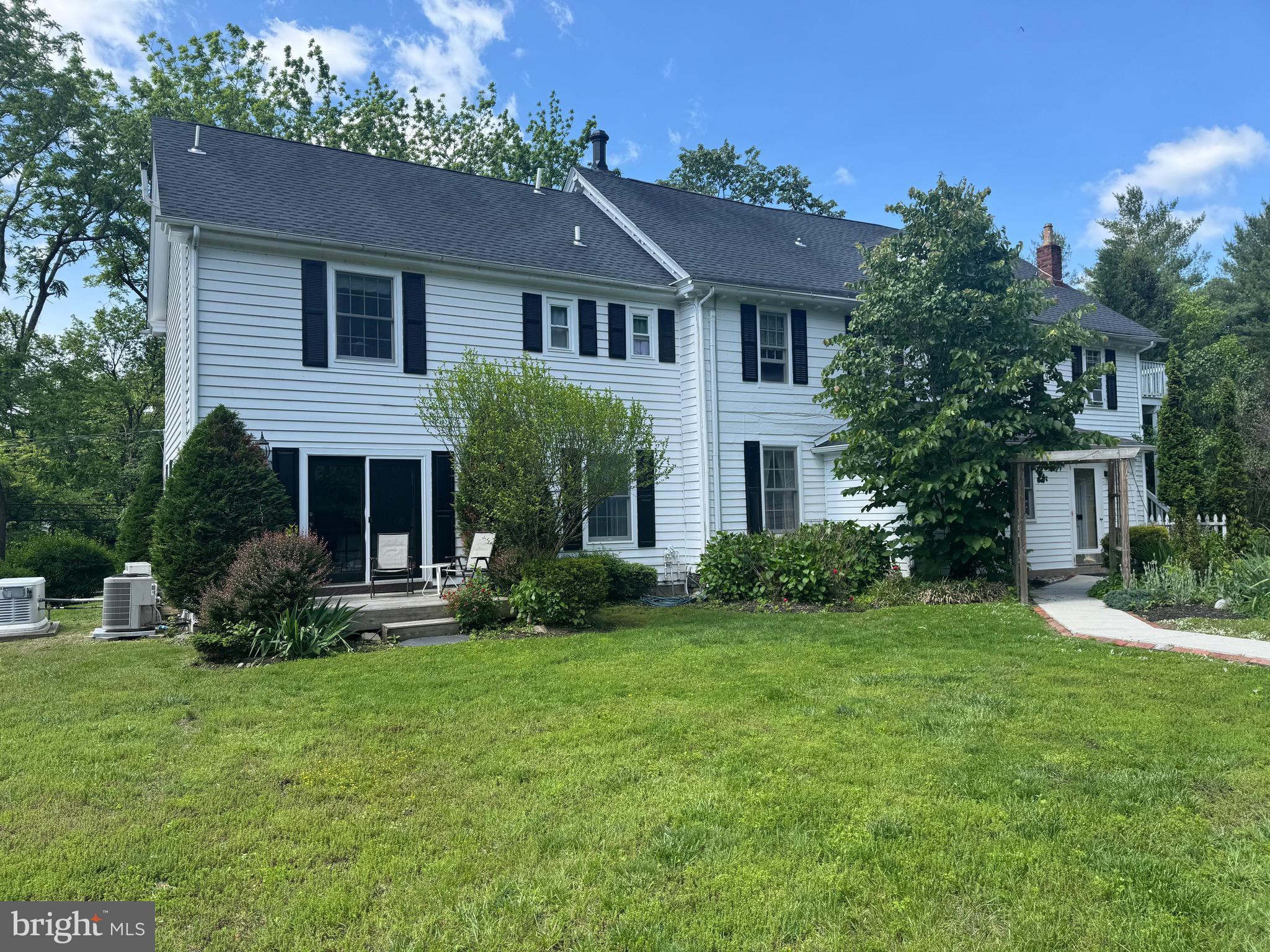 1324 River Road New Hope, PA 18938 - Photo 63 of 70 a front view of a house with a yard and trees