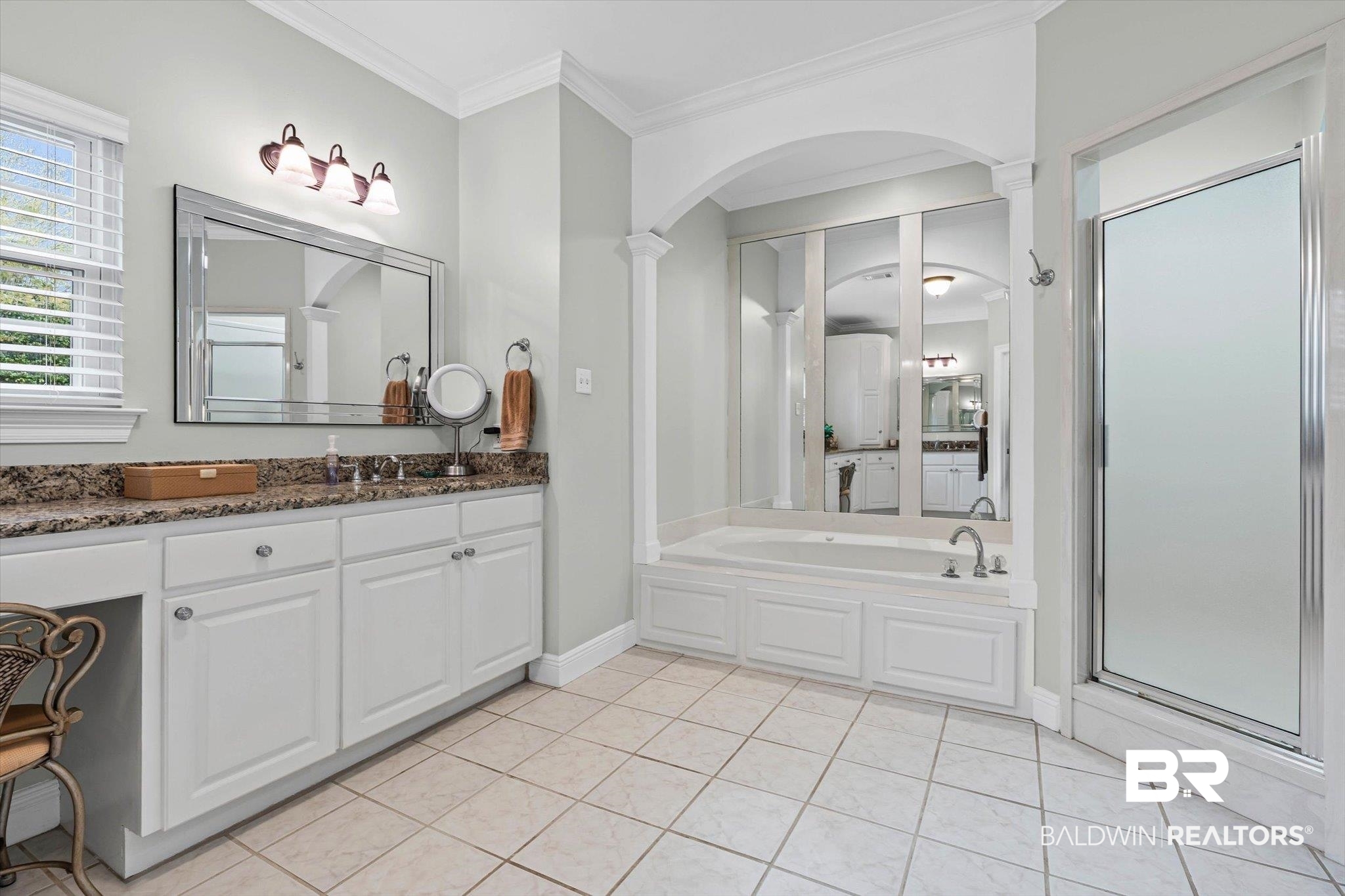 4851 Audubon Drive Mobile, AL 36619 - Photo 15 of 46 Full bathroom with a garden tub, ornamental molding, vanity, light tile patterned flooring, and a shower stall
