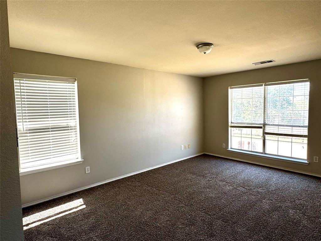 3433 Ingram Road Sachse, TX 75048 - Photo 14 of 23 an empty room with a window