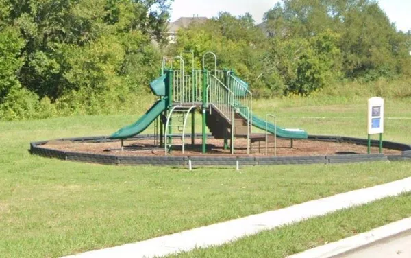 a view of a park with slide