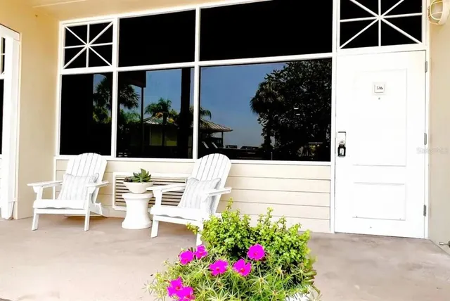 a kitchen with stainless steel appliances a refrigerator a sink a stove and cabinets