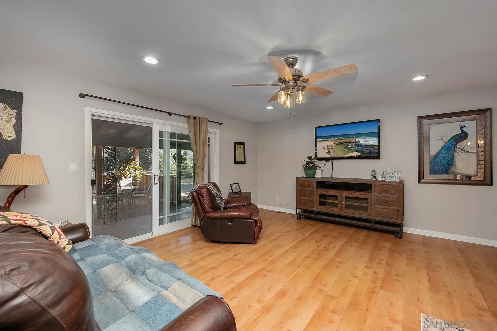 28710 Lone Pine Trail Pine Valley, CA 91962 - Photo 11 of 46 a bedroom with furniture and a chandelier