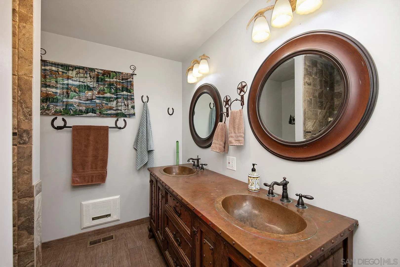 28710 Lone Pine Trail Pine Valley, CA 91962 - Photo 17 of 46 a bathroom with a sink and a mirror