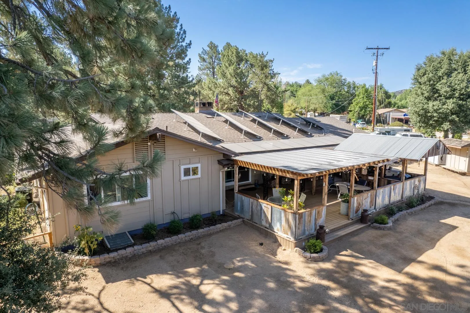 28710 Lone Pine Trail Pine Valley, CA 91962 - Photo 26 of 46 a roof deck with a table and chairs