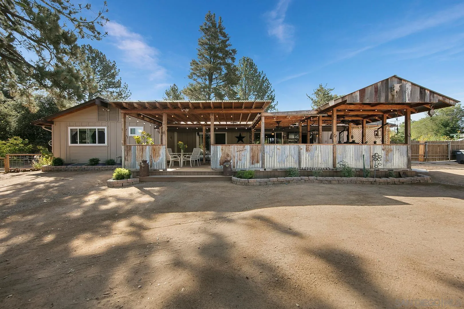 28710 Lone Pine Trail Pine Valley, CA 91962 - Photo 27 of 46 a view of a house with a yard