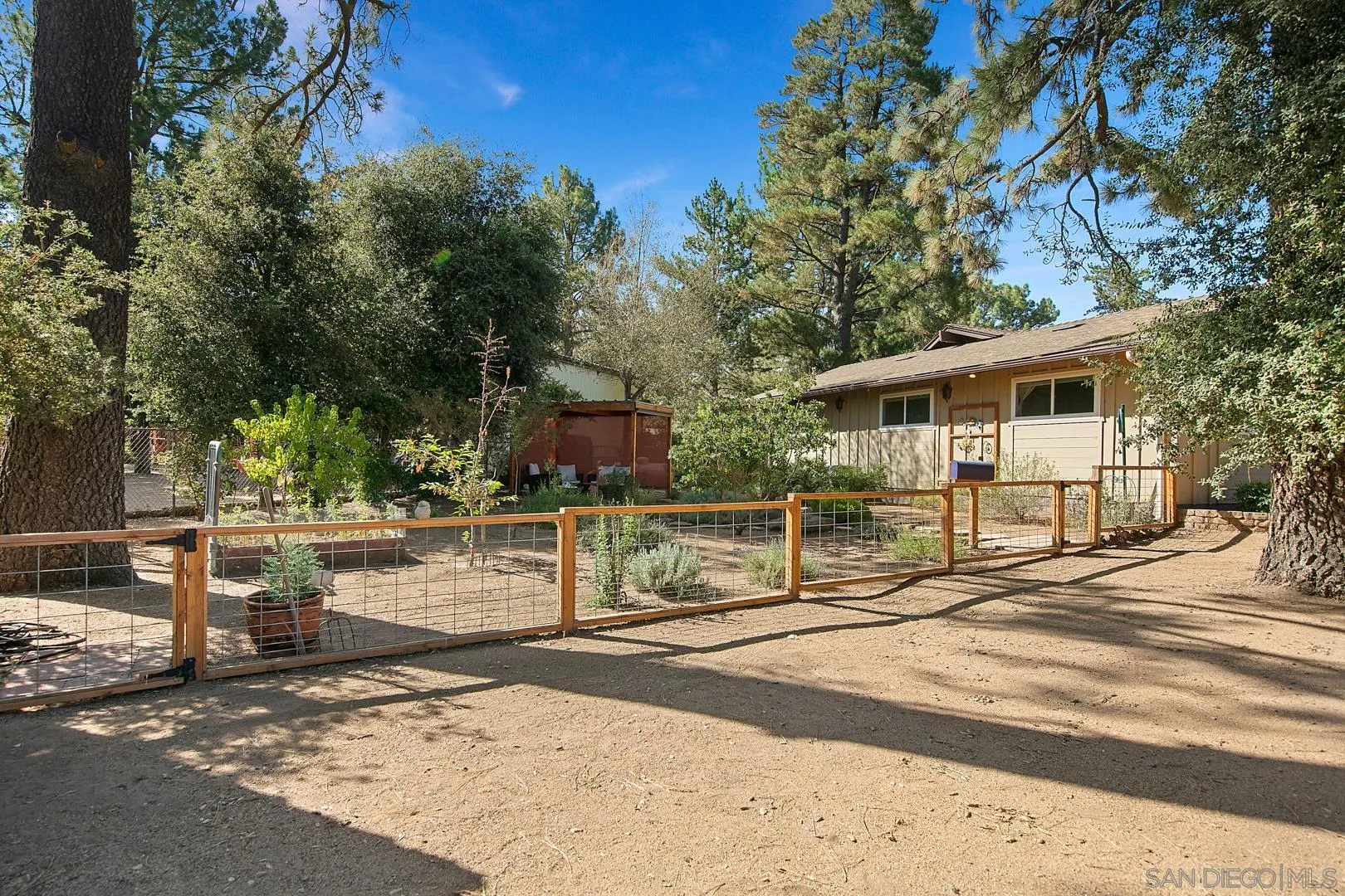28710 Lone Pine Trail Pine Valley, CA 91962 - Photo 37 of 46 a view of a white house with a patio