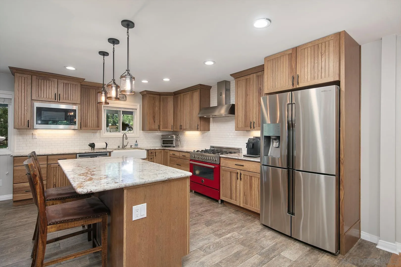 28710 Lone Pine Trail Pine Valley, CA 91962 - Photo 5 of 46 a kitchen with stainless steel appliances granite countertop a refrigerator a sink dishwasher a stove and a refrigerator