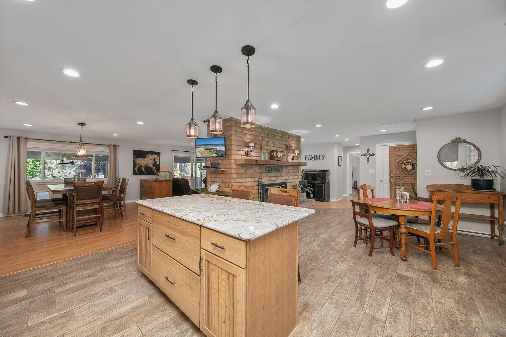 28710 Lone Pine Trail Pine Valley, CA 91962 - Photo 6 of 46 a large kitchen with a table and chairs