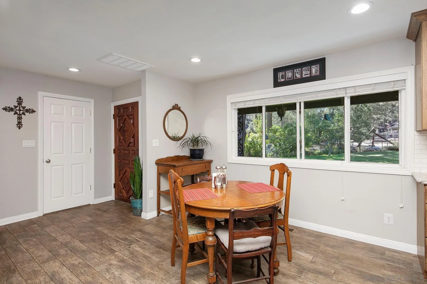 28710 Lone Pine Trail Pine Valley, CA 91962 - Photo 7 of 46 a dining room with furniture a window and outside view