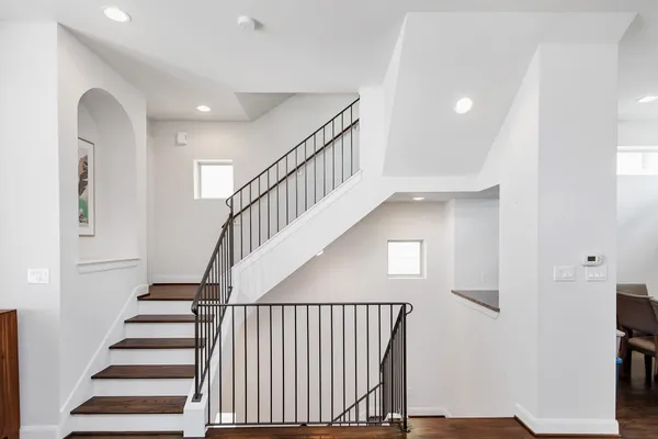 a view of entryway with wooden floor