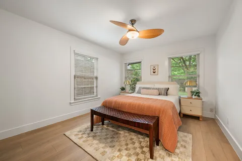 a kitchen with a table and chairs in it