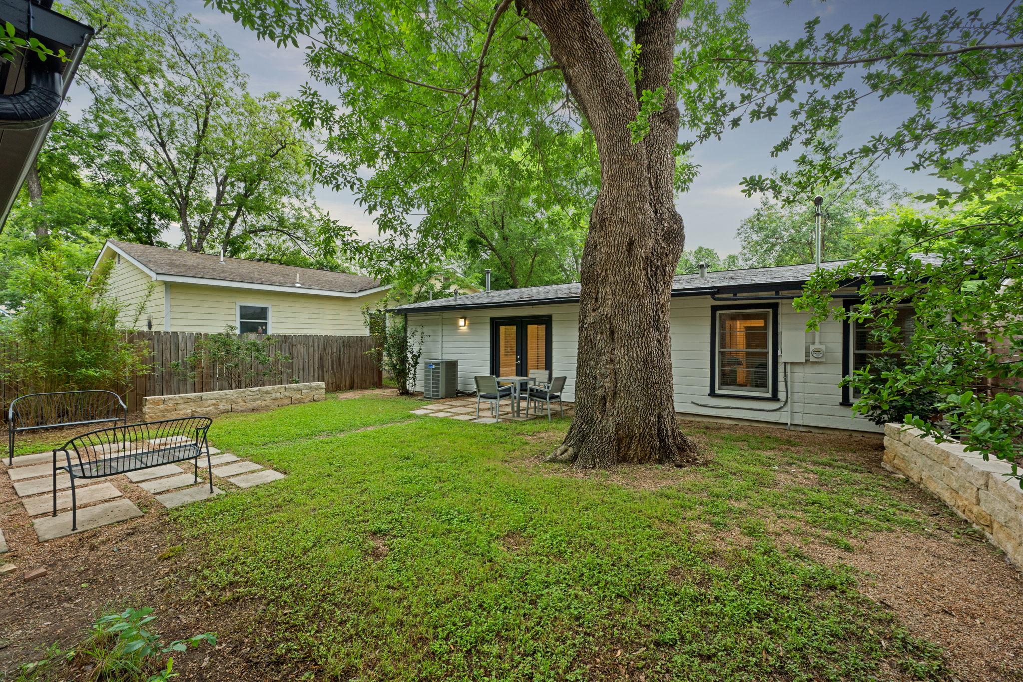 5506 Duval Street Austin, TX 78751 - Photo 26 of 38 front view of a house with a yard