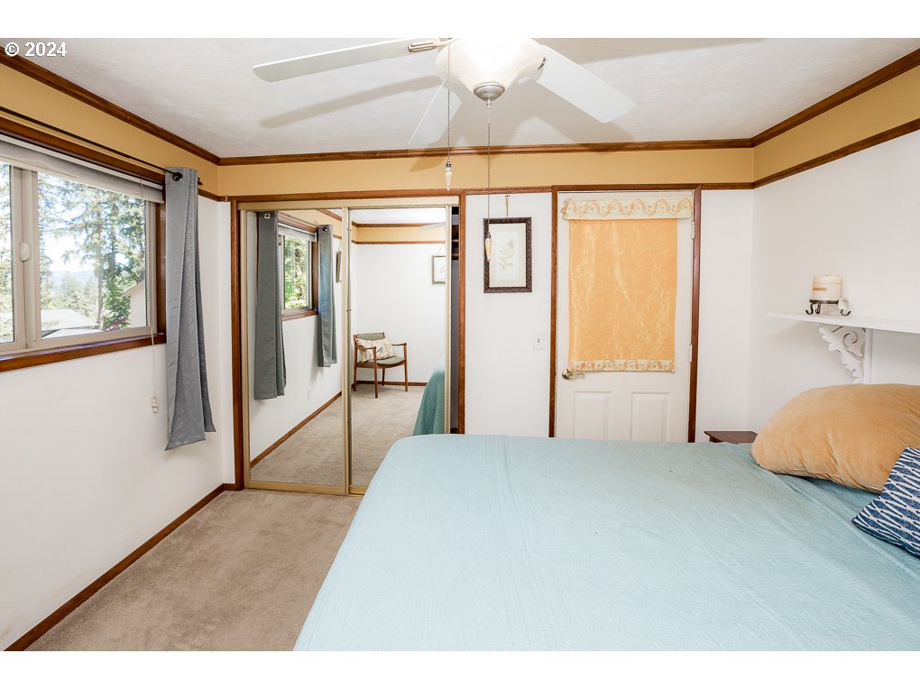 594 South 72nd Street Springfield, OR 97478 - Photo 12 of 14 a bedroom with furniture and a window