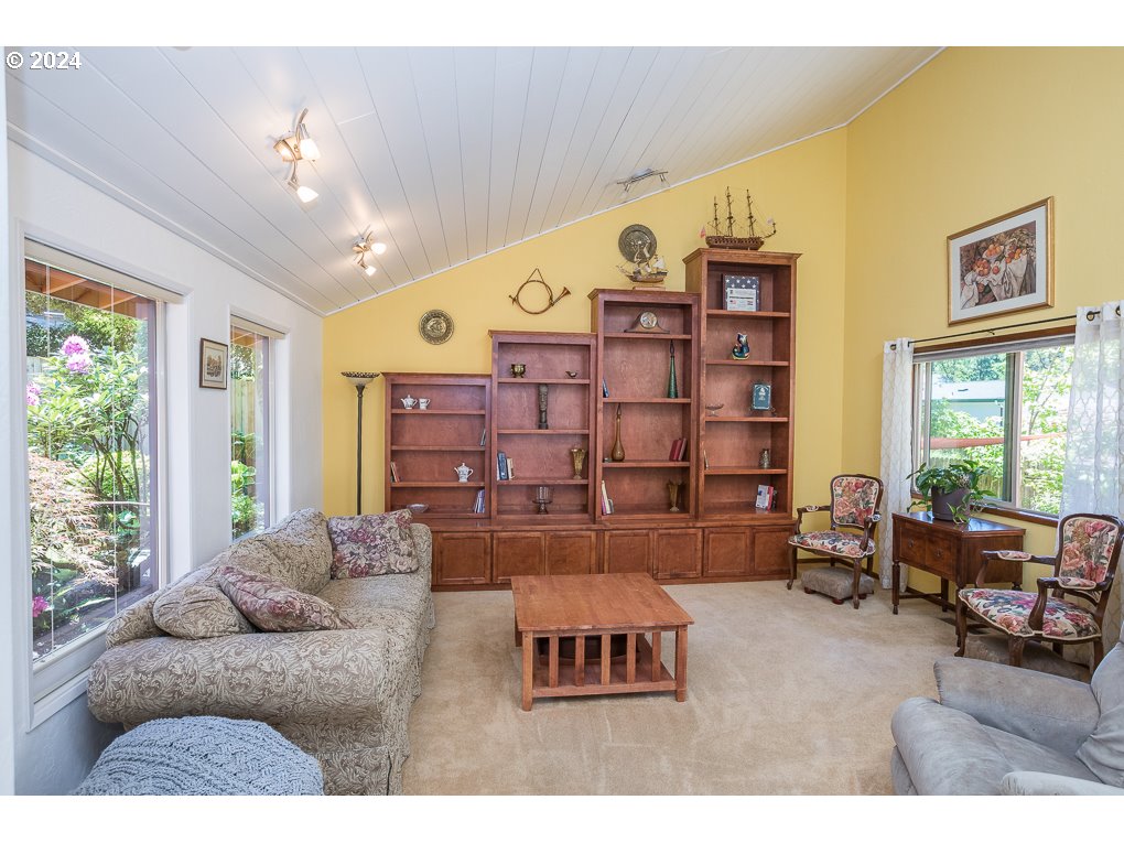 594 South 72nd Street Springfield, OR 97478 - Photo 6 of 14 a living room with furniture and a large window