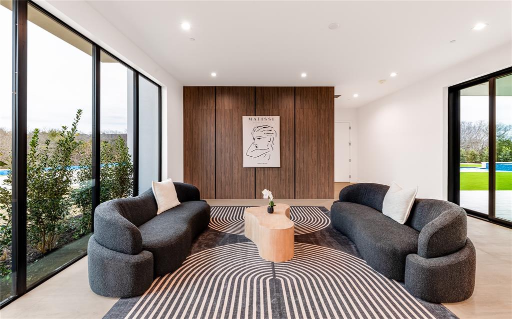 229 Sunset Pt Trail Heath, TX 75032 - Photo 13 of 40 a living room with furniture and a large window