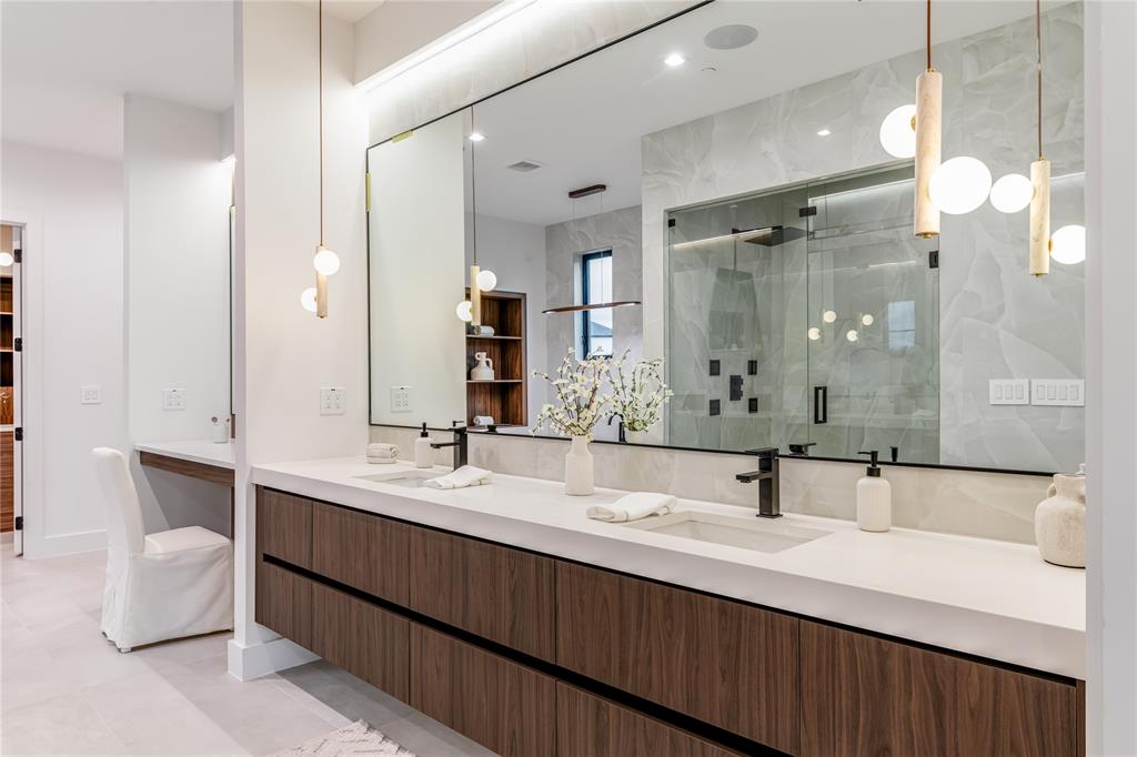 229 Sunset Pt Trail Heath, TX 75032 - Photo 19 of 40 a bathroom with a double vanity sink mirror and double