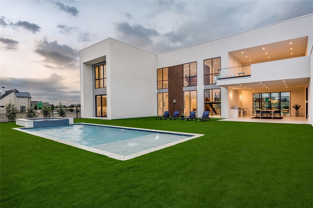 229 Sunset Pt Trail Heath, TX 75032 - Photo 38 of 40 a view of a building with a yard