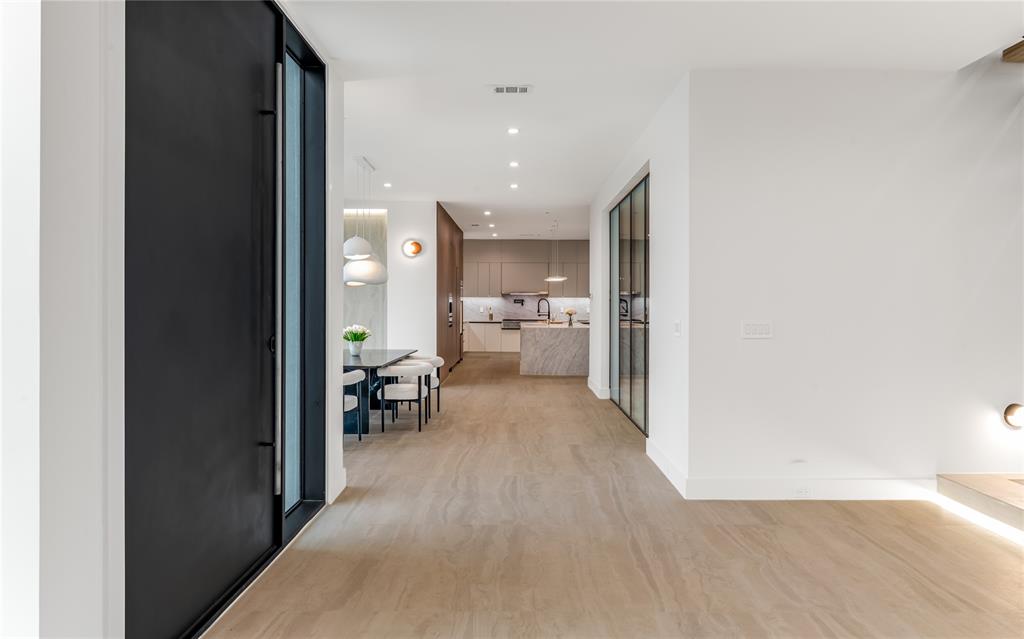 229 Sunset Pt Trail Heath, TX 75032 - Photo 4 of 40 a view of a living room with a wooden floor