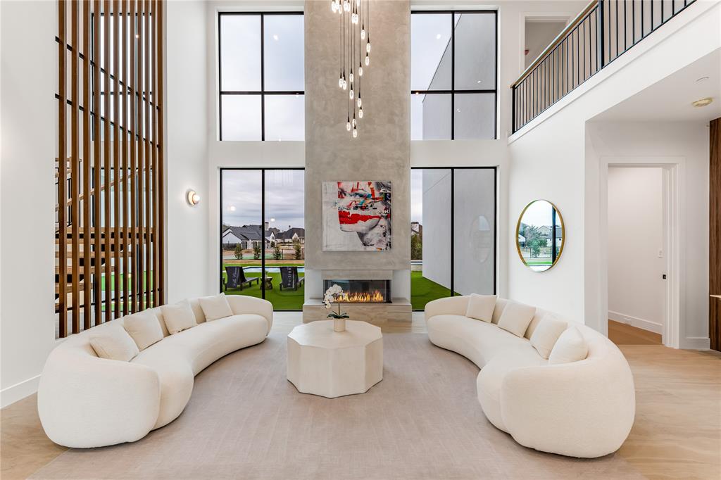 229 Sunset Pt Trail Heath, TX 75032 - Photo 7 of 40 a living room with furniture and a window