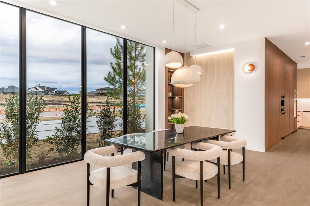 229 Sunset Pt Trail Heath, TX 75032 - Photo 8 of 40 a dining room with furniture and window