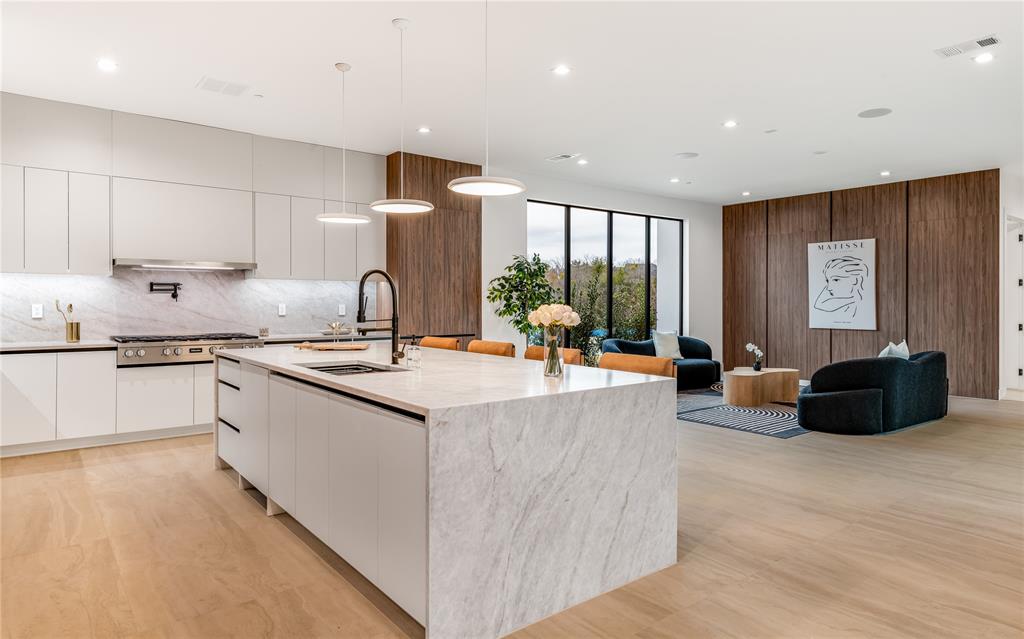 229 Sunset Pt Trail Heath, TX 75032 - Photo 10 of 40 a large white kitchen with a large window