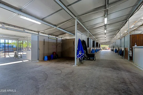 a view of a chairs and table in the patio