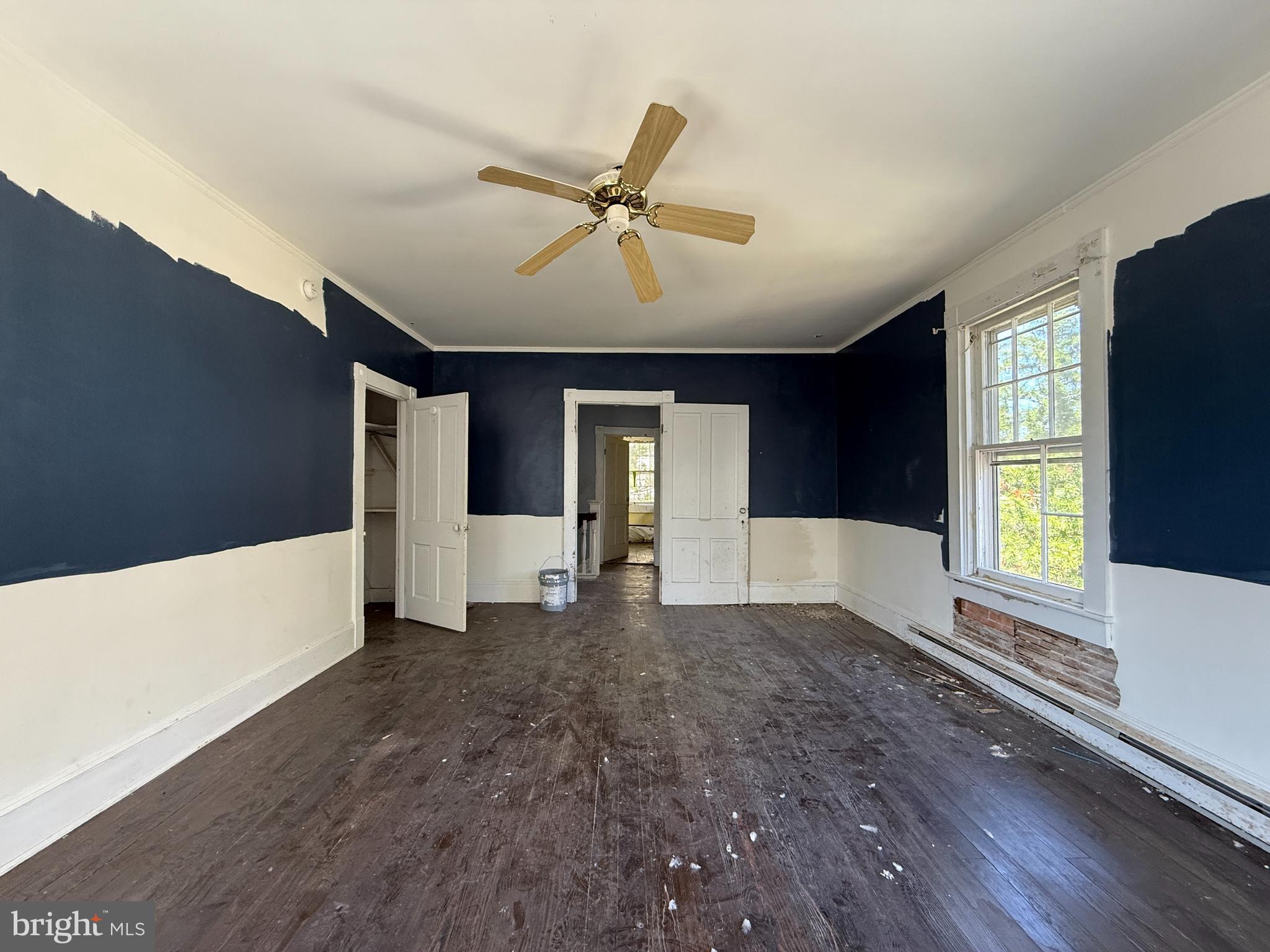 30560 Washington Street Princess Anne, MD 21853 - Photo 14 of 29 a view of empty room with window and wooden floor