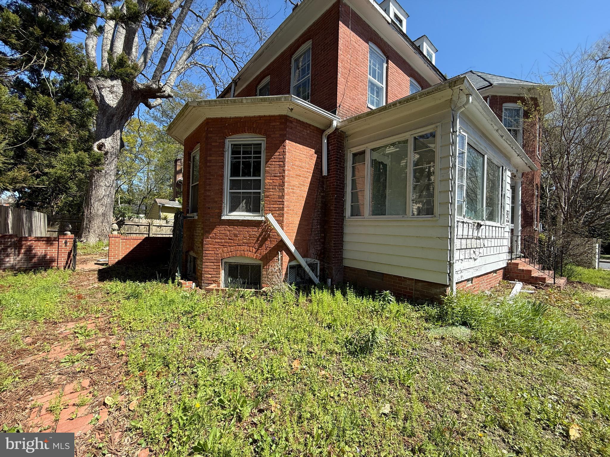 30560 Washington Street Princess Anne, MD 21853 - Photo 24 of 29 a front view of a house with garden
