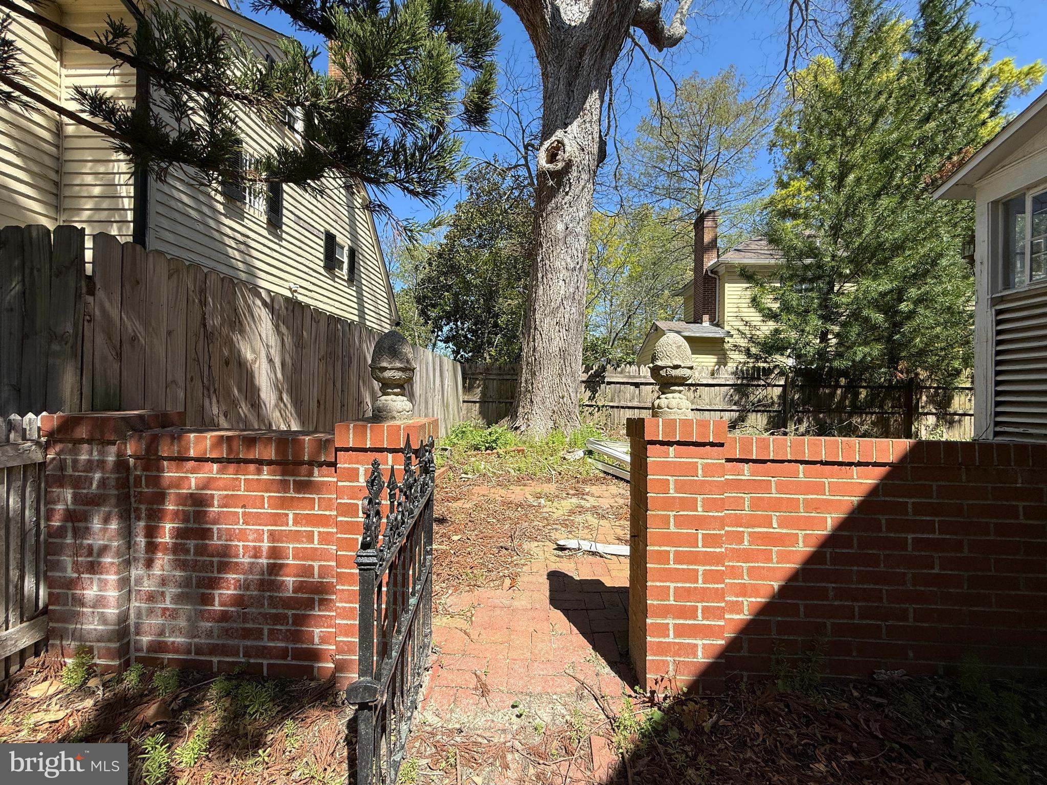 30560 Washington Street Princess Anne, MD 21853 - Photo 25 of 29 a view of a pathway with a building in the background