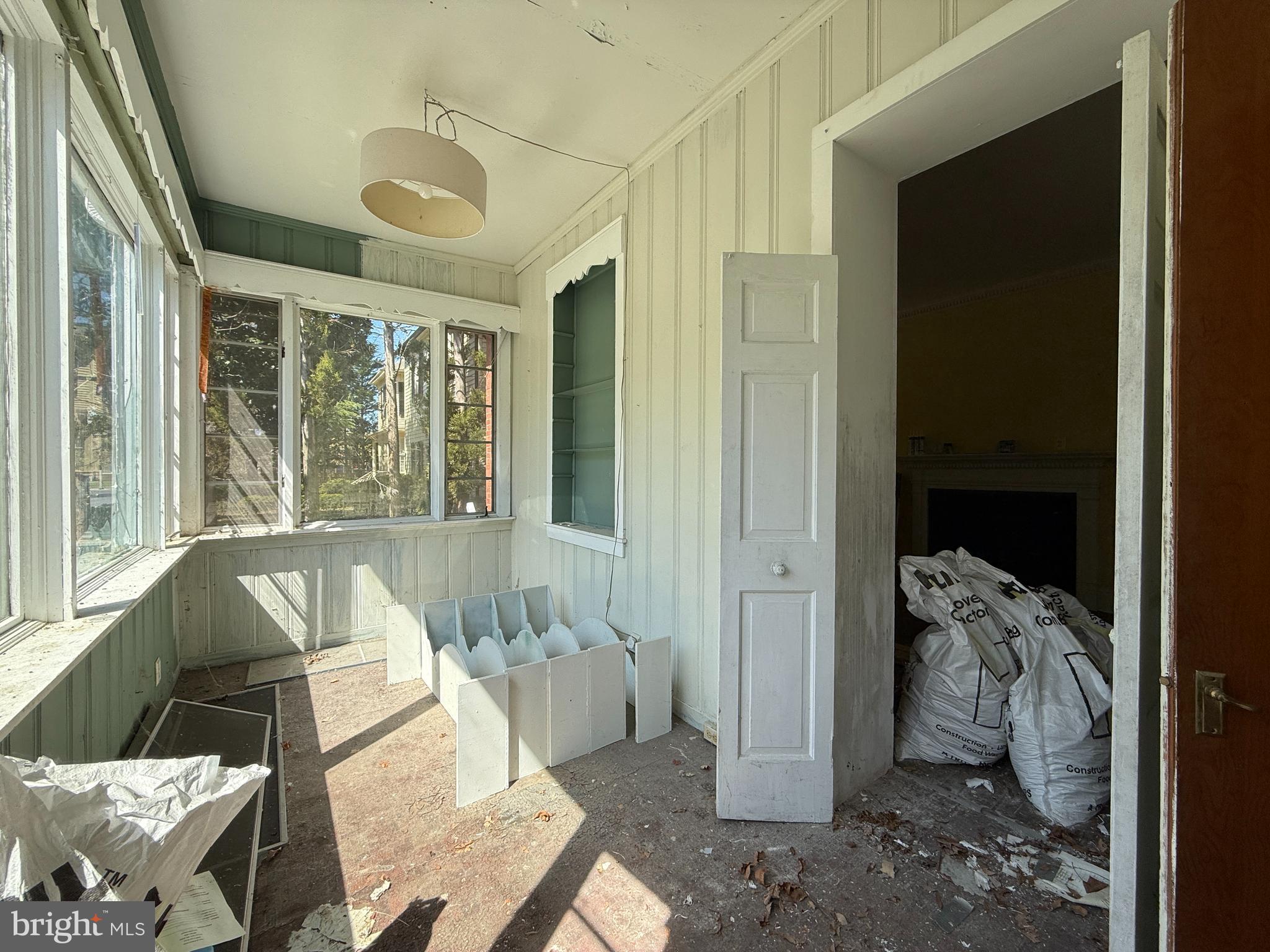 30560 Washington Street Princess Anne, MD 21853 - Photo 3 of 29 a living room with furniture and a large window