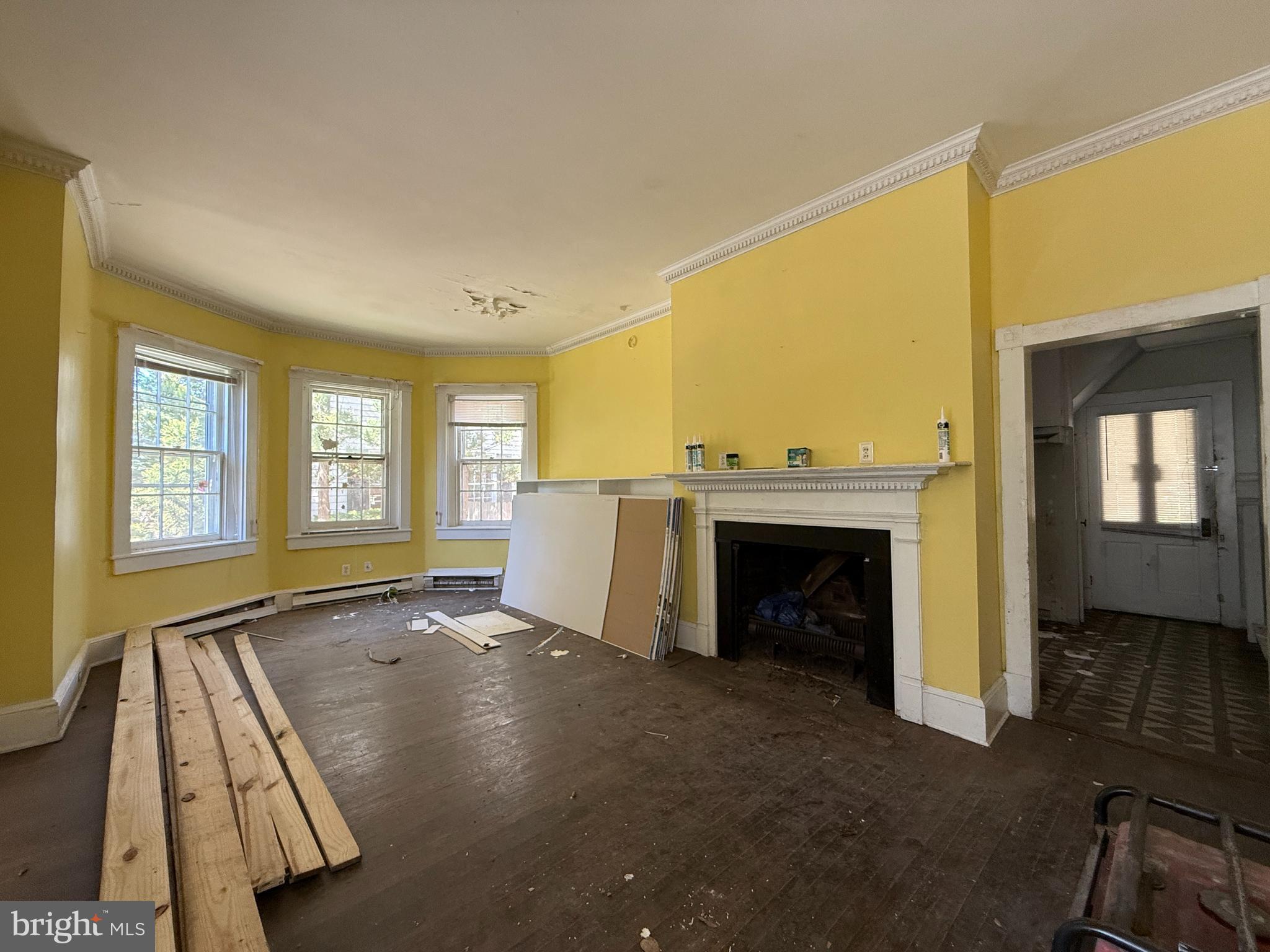 30560 Washington Street Princess Anne, MD 21853 - Photo 5 of 29 a view of an empty room with a fireplace