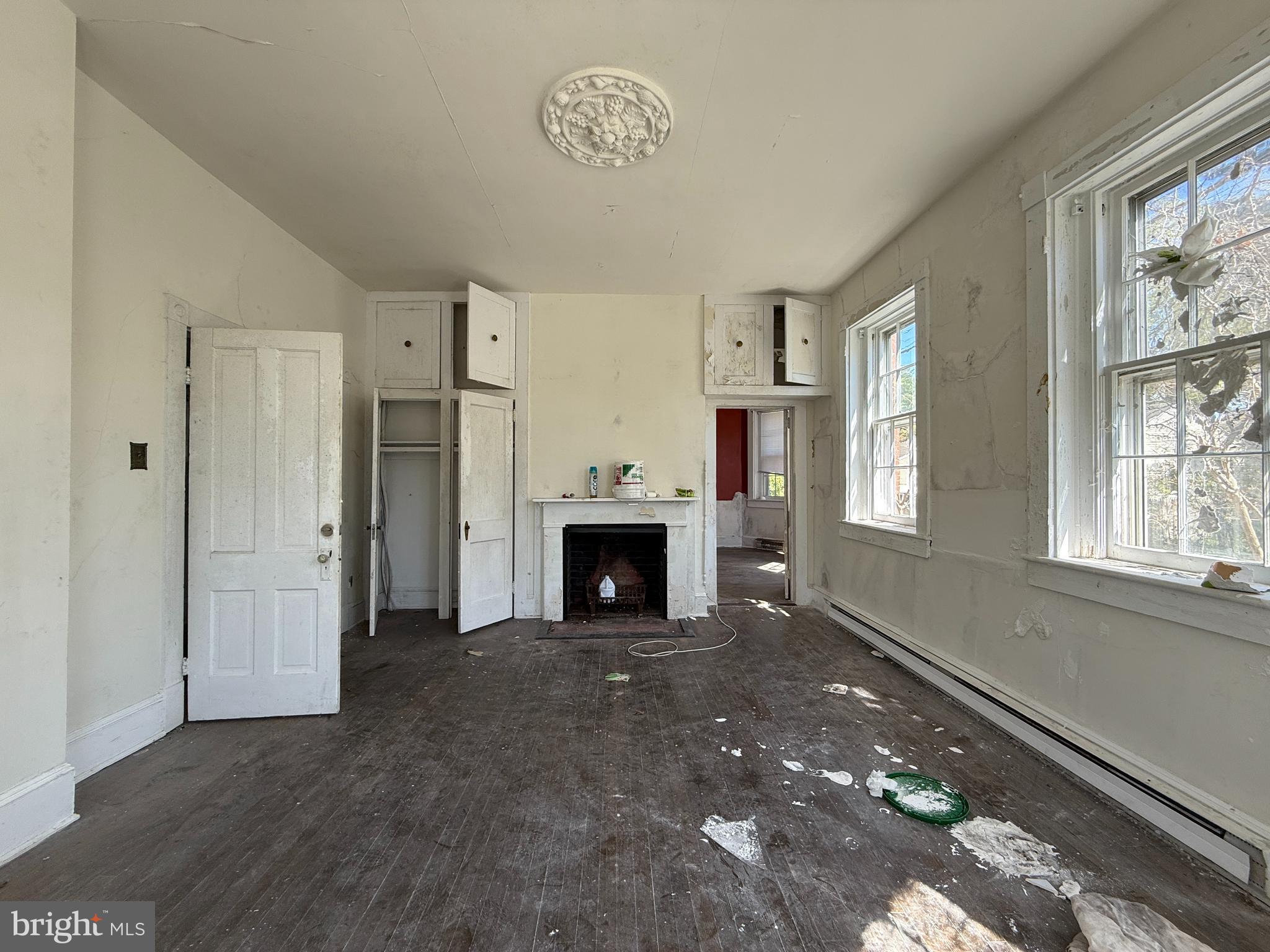 30560 Washington Street Princess Anne, MD 21853 - Photo 9 of 29 a view of a livingroom with a fireplace window and a fireplace