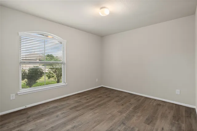 a view of a room that has a window in it