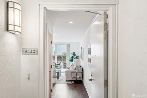 a view of a building with a tree