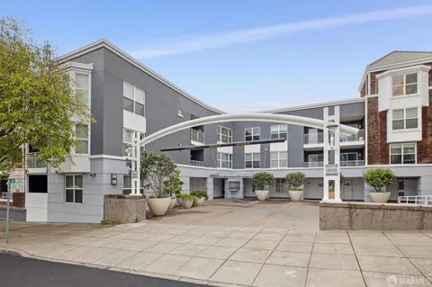 a view of a living room and entry way