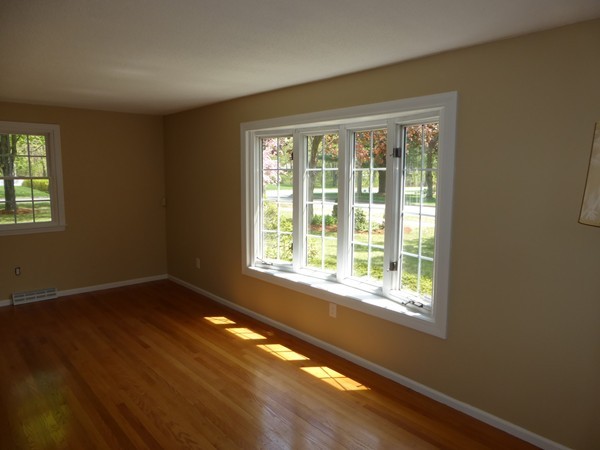 8 Metacomet Road Longmeadow, MA 01106 - Photo 7 of 16 a view of an empty room with wooden floor and a window